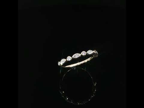 Angled view of a 14K yellow gold anniversary band showcasing alternating marquise and round lab grown diamonds with D–F color and VS–VVS clarity.