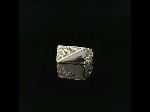 Front view of a 14K yellow gold men’s nugget ring with a rectangular face divided diagonally into textured and polished sections.
