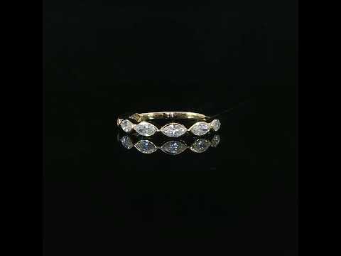 Video of East-west marquise diamonds meet tip to tip across the front of a polished yellow gold band.