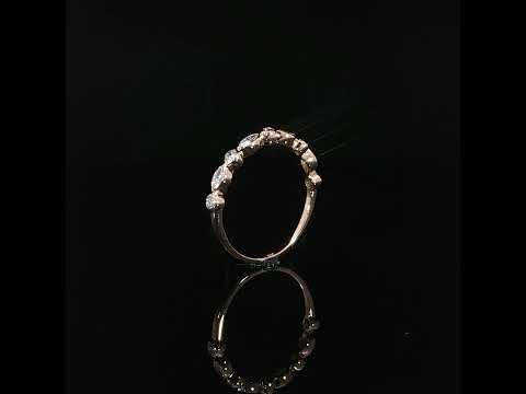 Upright video of 14K rose gold bezel diamond ring featuring 0.41 total carats of lab grown diamonds.