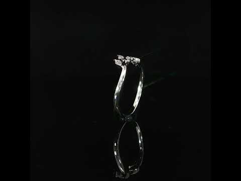 Delicate 14K white gold diamond leaf wedding band with 0.06 CTW lab grown diamonds and an elegant curved vine design.