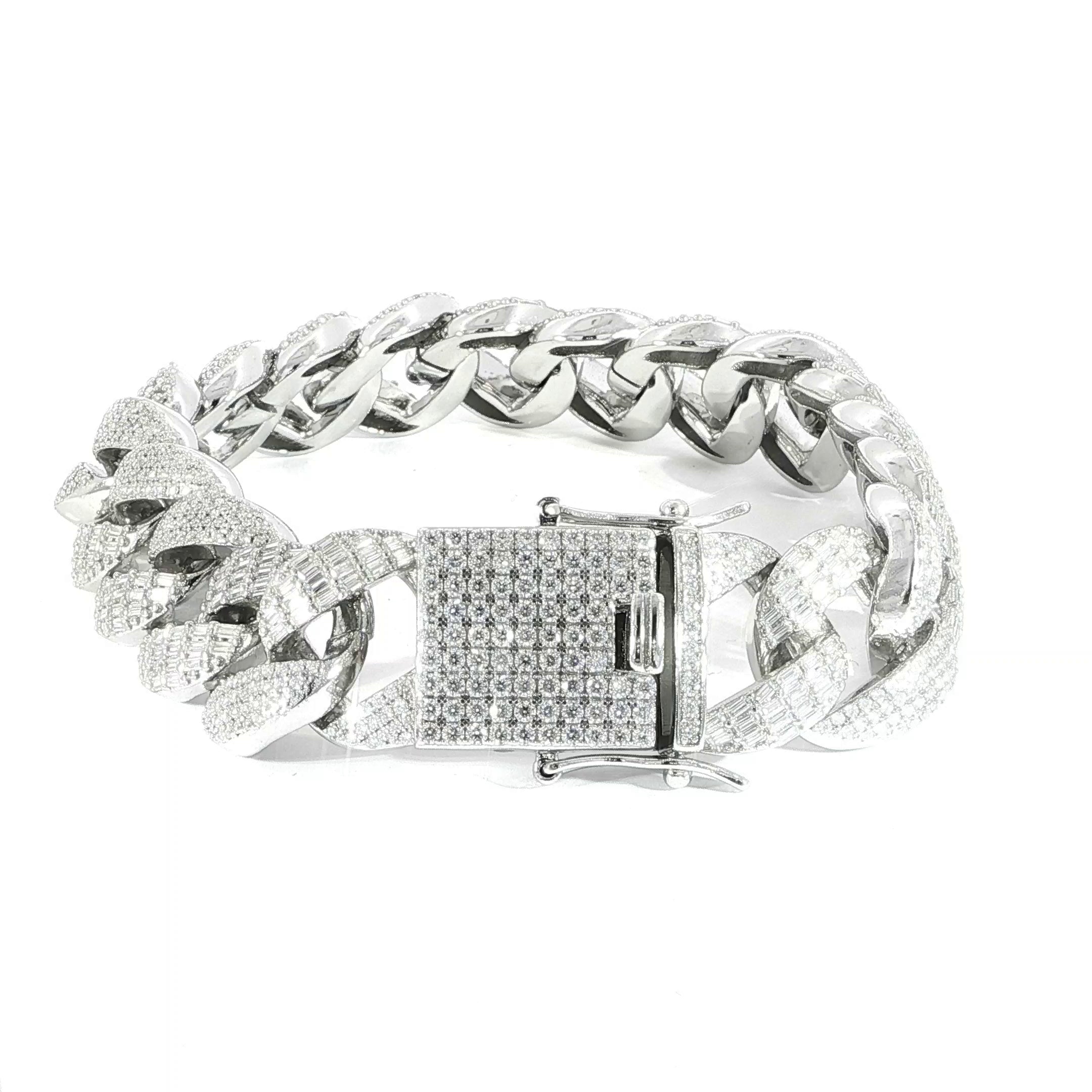 Video of 17MM Cuban bracelet with baguette and round cut moissanite stones and hidden box clasp.