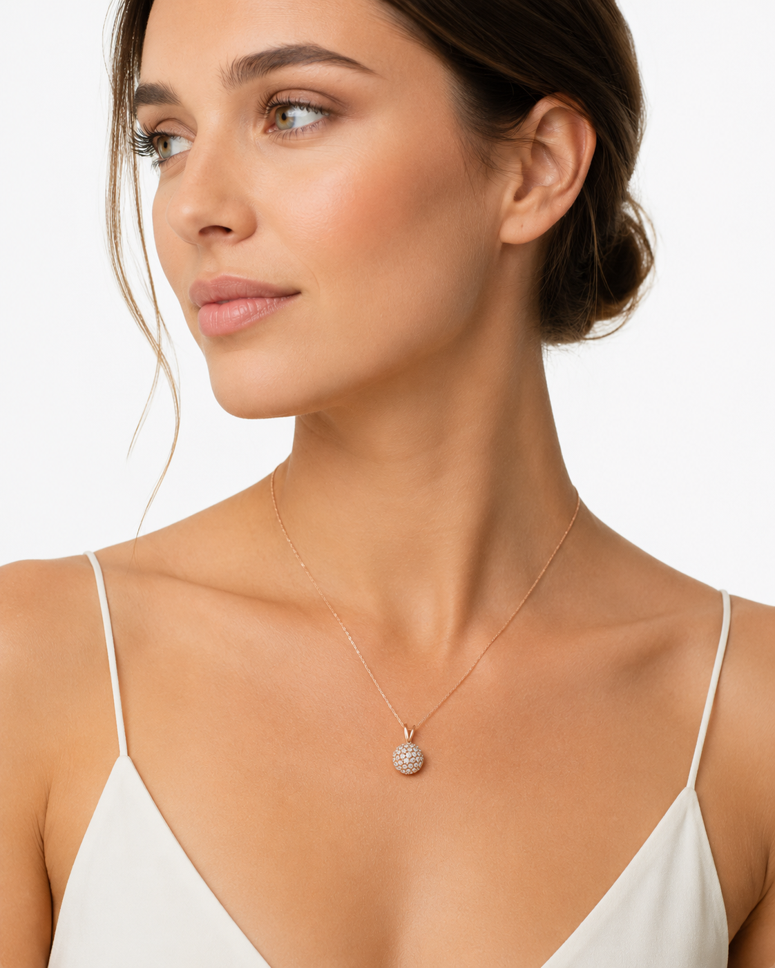 Natural diamond sphere pendant crafted in 14K rose gold with pavé setting