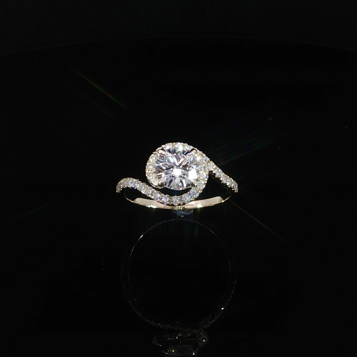 Front view of 14K yellow gold flowing bypass engagement ring with 1 carat round lab-grown diamond