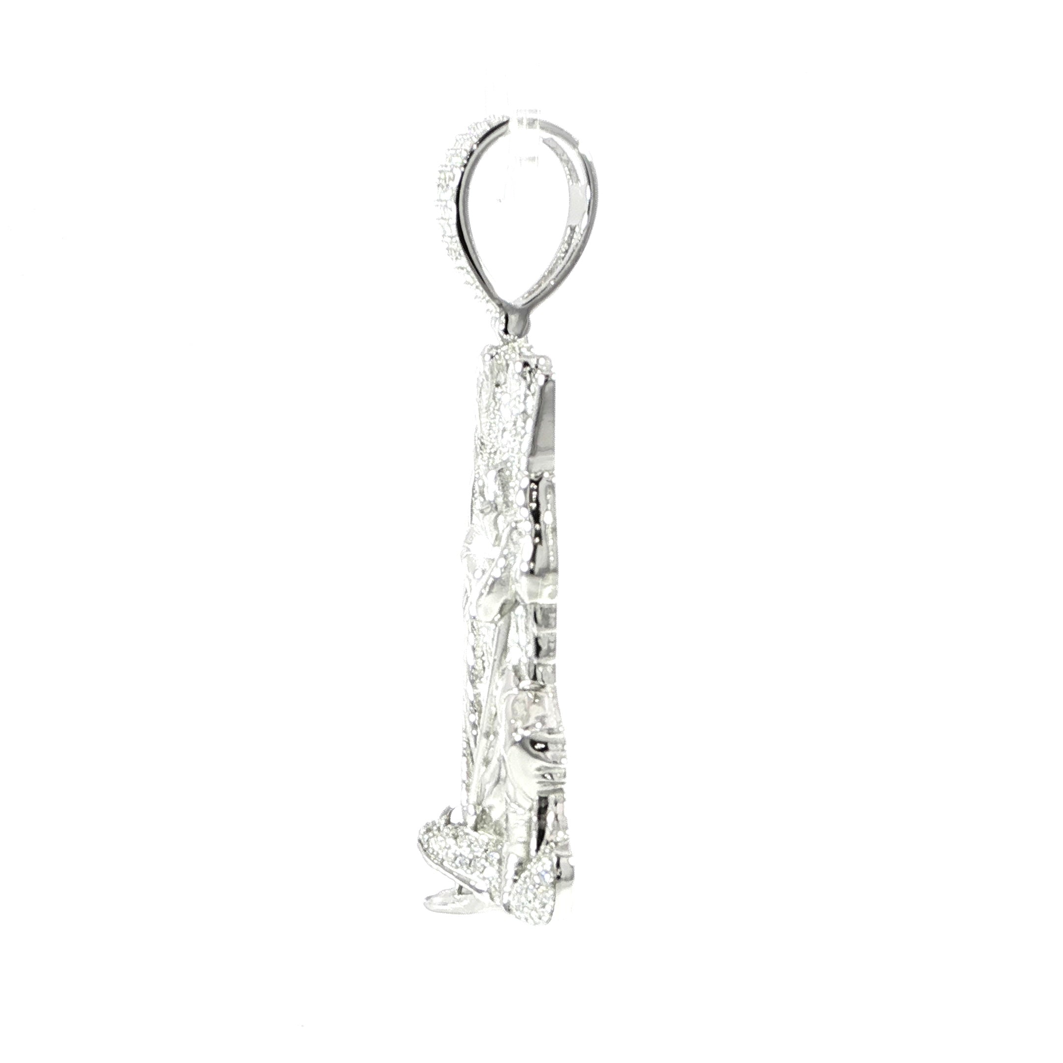 Side detail religious pendant featuring Archangel Saint Michael with a sword.