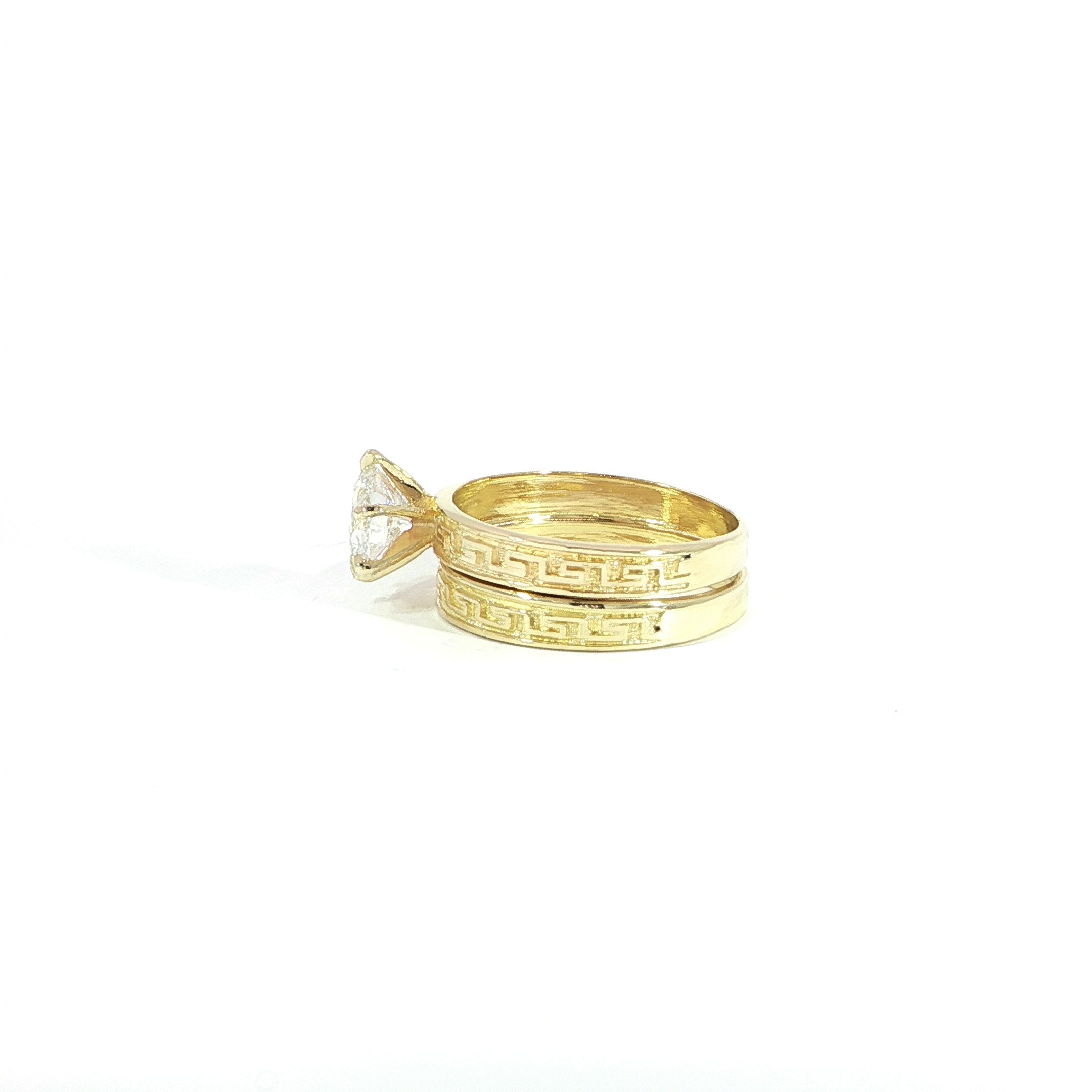 Greek Key bridal ring set featuring a 1.21 carat round lab grown diamond in 10K yellow gold