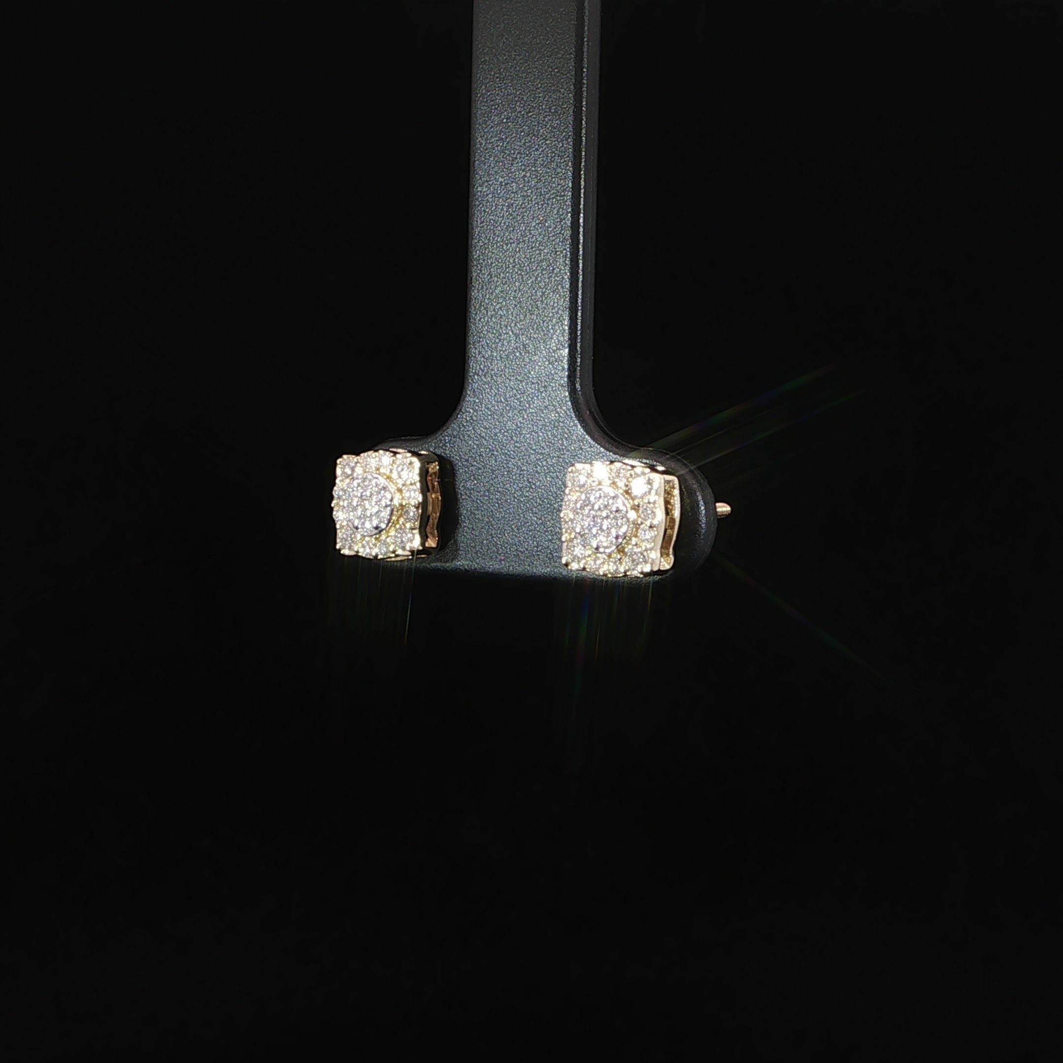 Natural diamond cushion-shaped cluster earrings featuring 0.27 CTW