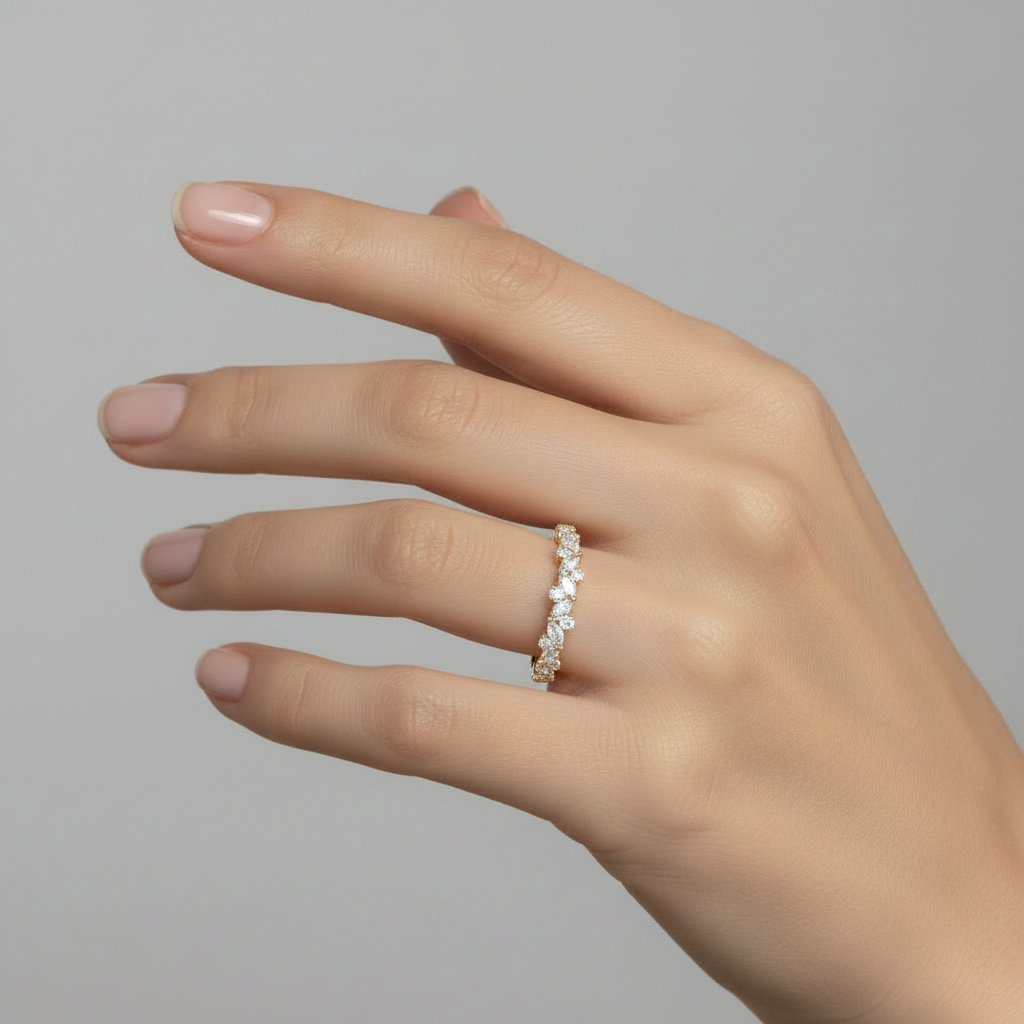Mixed diamond shape band with marquise and round diamonds on hand model