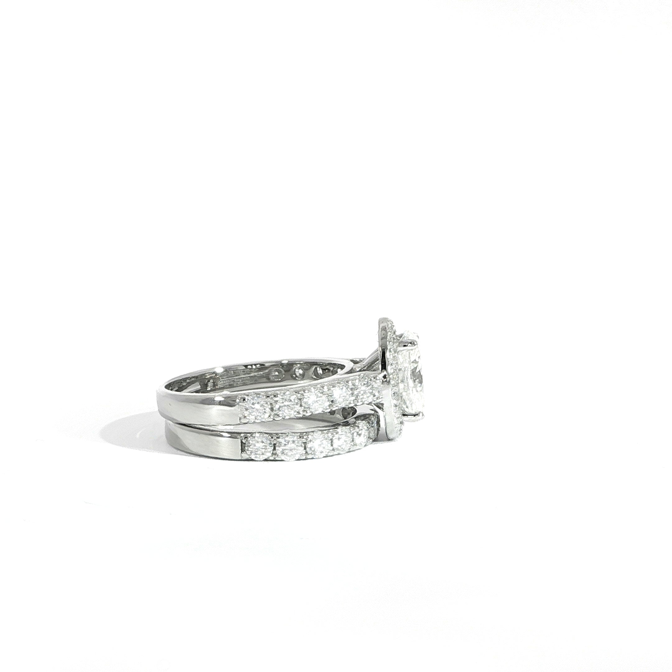 Side view of VVS moissanite oval halo ring set in sterling silver