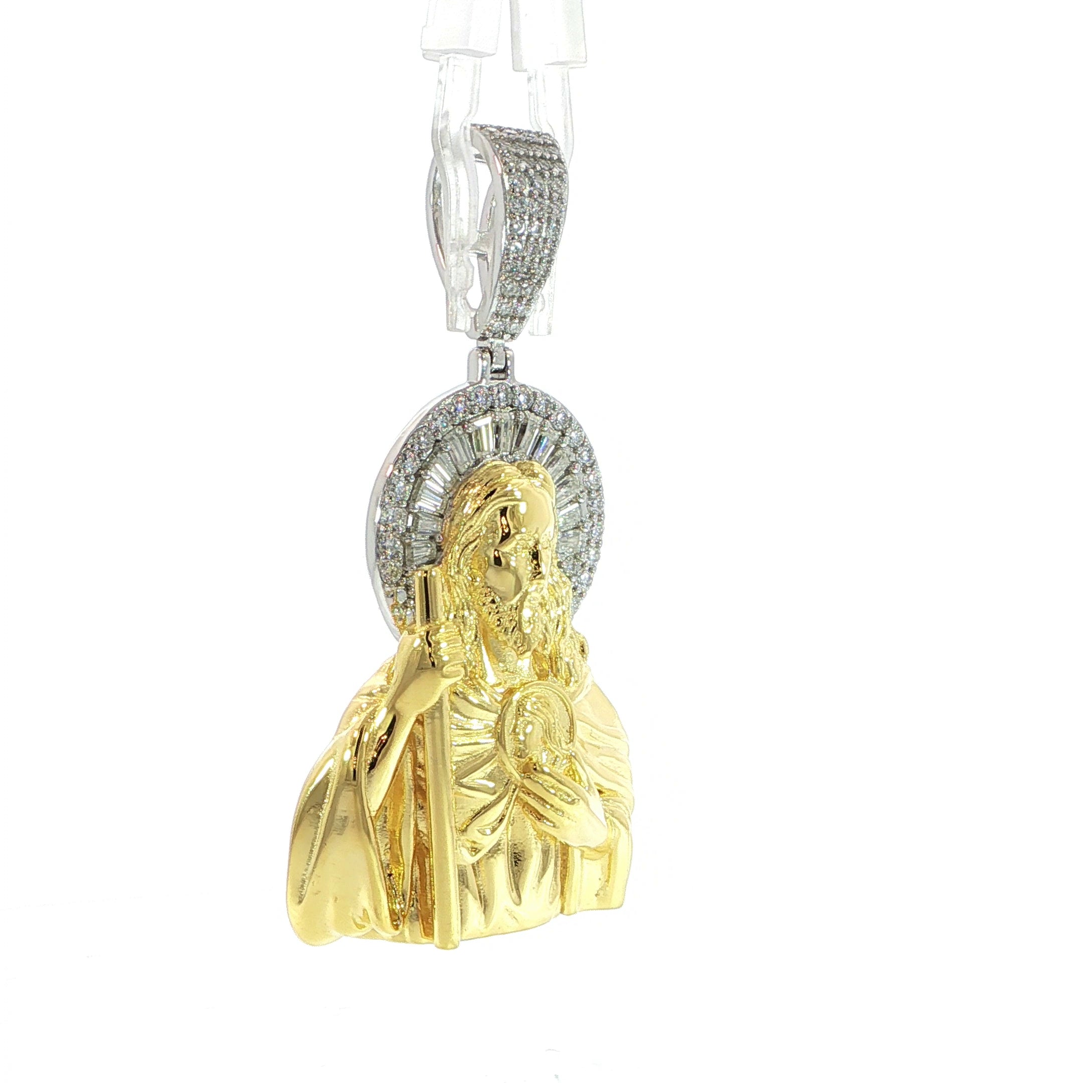 Religious sterling silver pendant with yellow-tone Jesus and sparkling moissanite halo