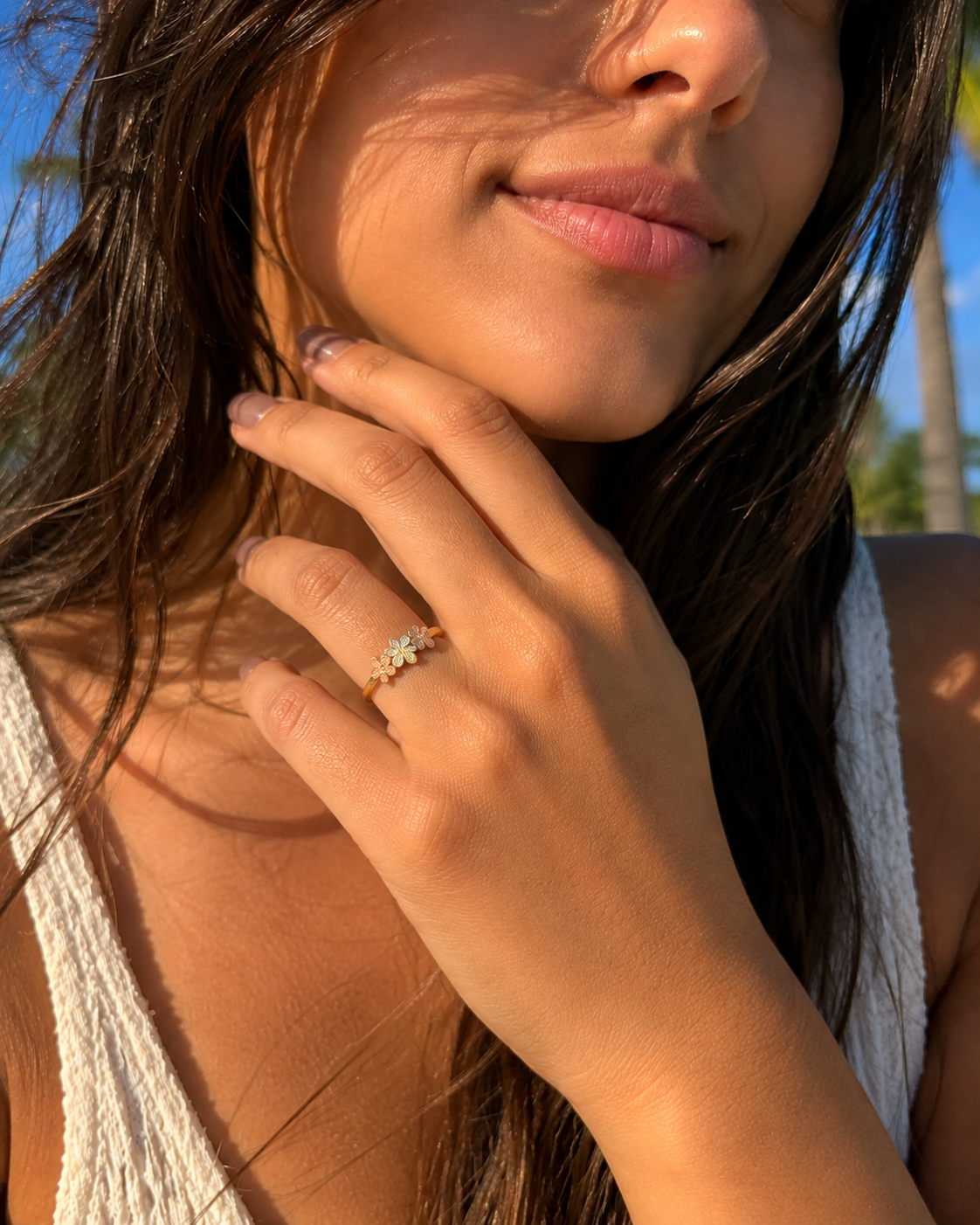 Elegant Hawaiian-inspired plumeria ring crafted in 14K gold
