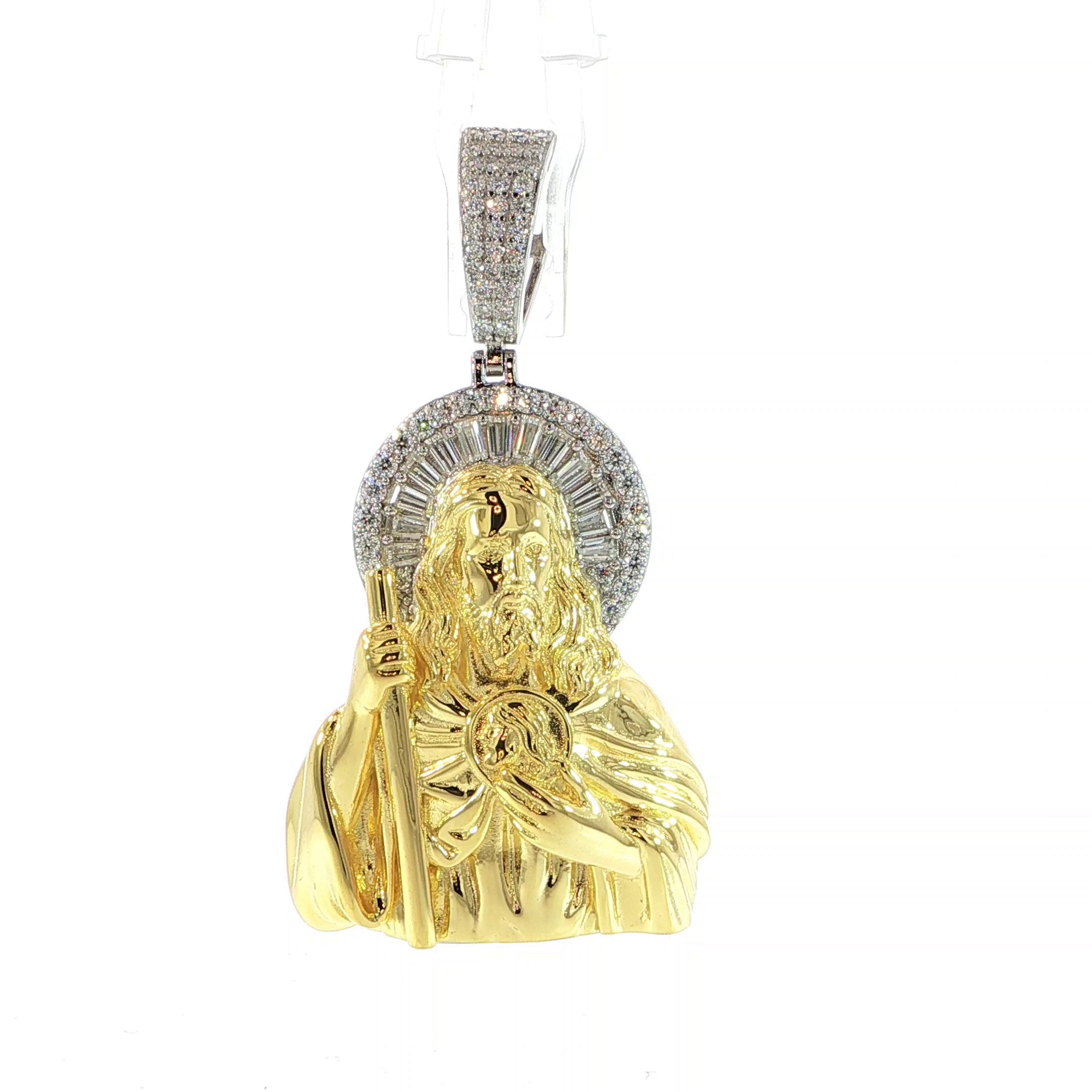 Two-tone Sacred Heart of Jesus pendant in sterling silver with VVS moissanite baguette halo.