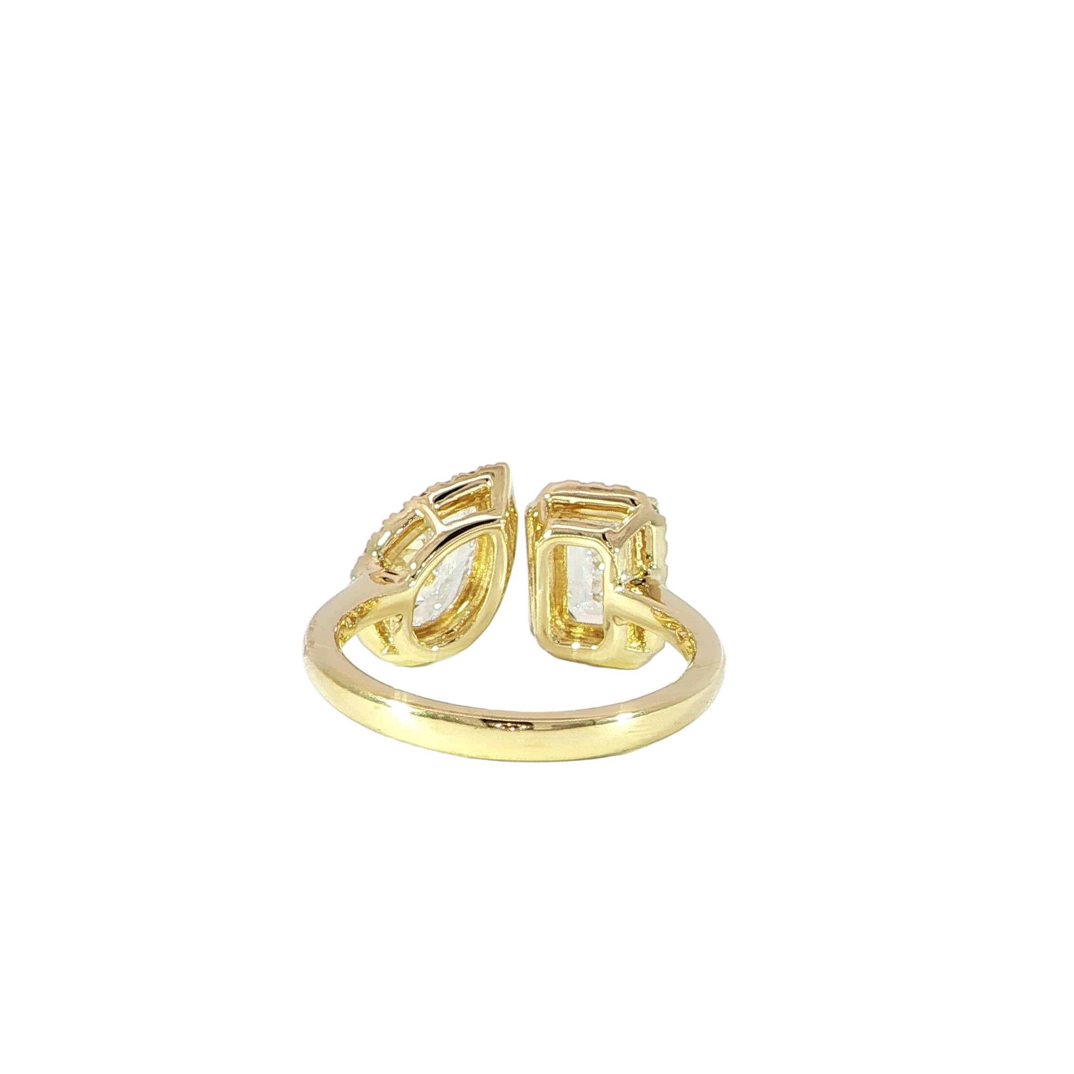 14K gold ring with emerald and pear shaped center stones