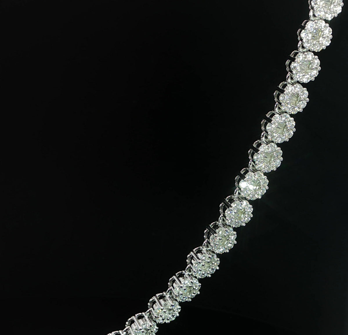 Moissanite flower cluster tennis chain featuring 22.68 CTW