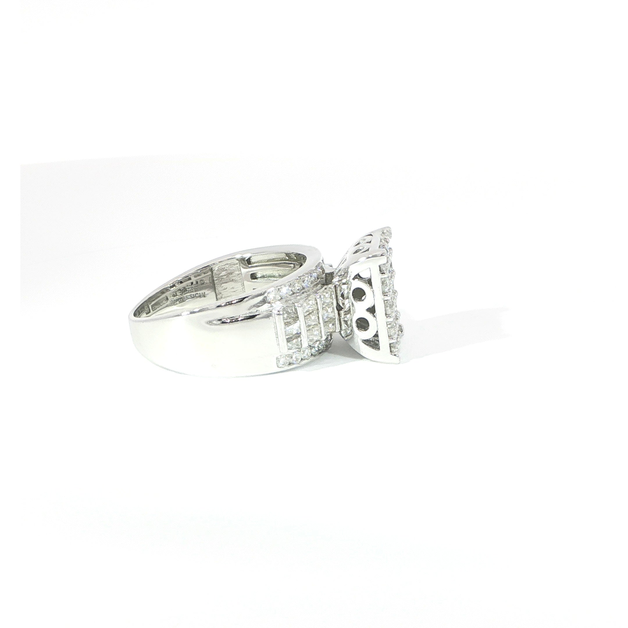 Side silver ring featuring a rectangular stone cluster design
