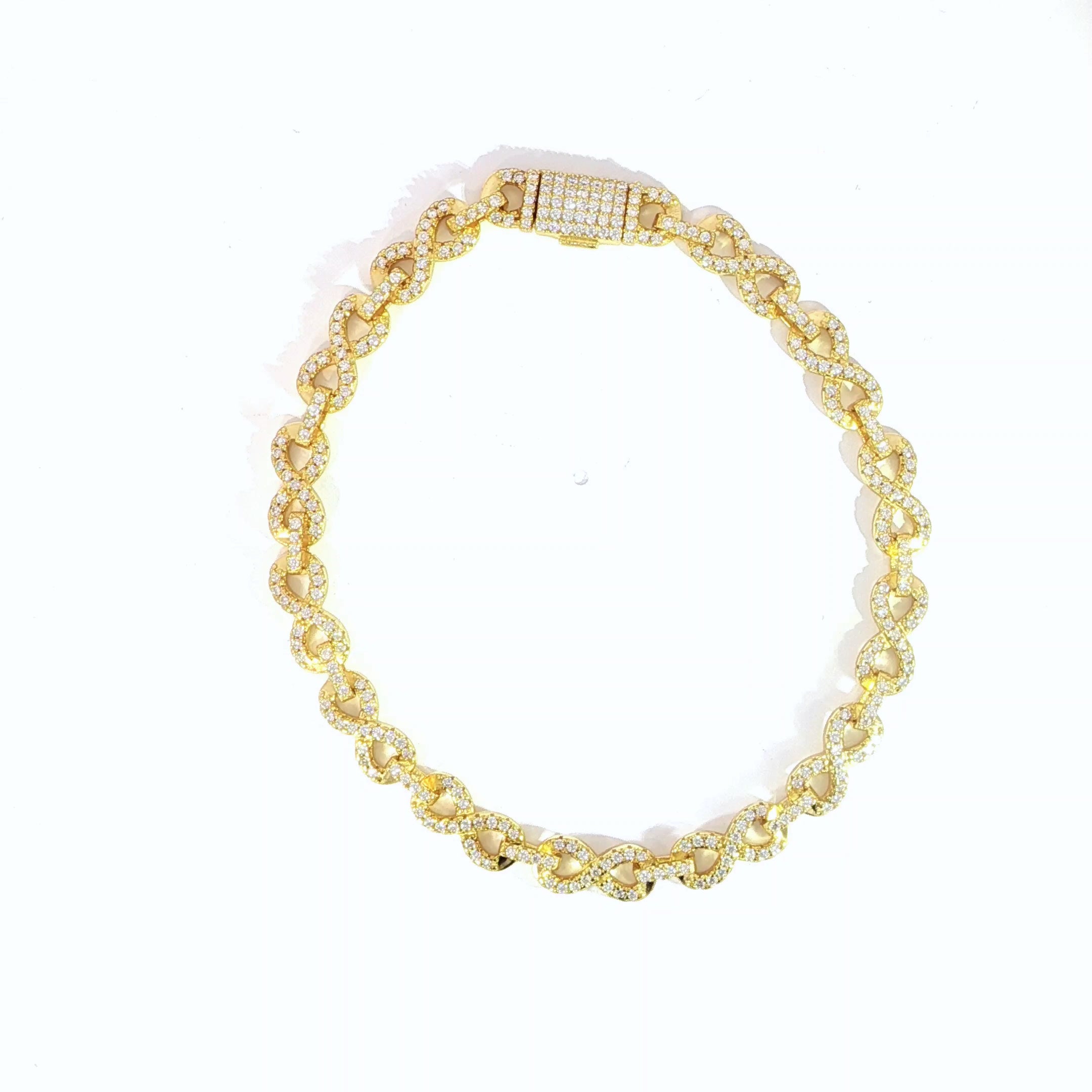 Luxury sterling silver infinity link bracelet with VVS moissanite, perfect anniversary jewelry gift for her.