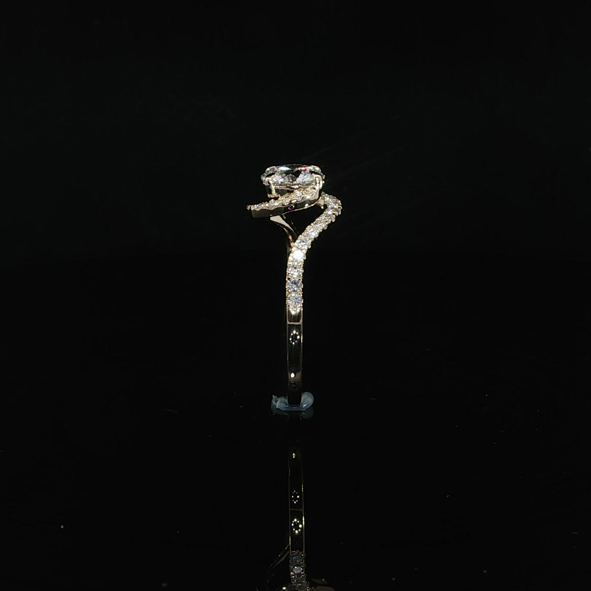 Straight view of round lab-grown diamond bypass ring in 14K yellow gold